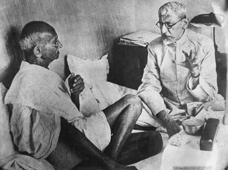 Photo of Gandhiji with Maulana Abul Kalam Azad discussing about a letter written by Sir Stafford Cripps, 1945..jpg